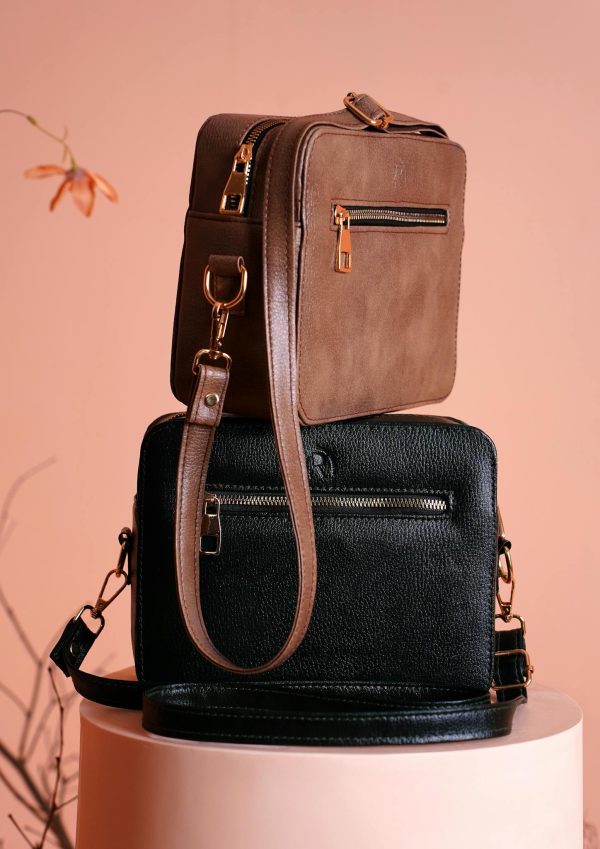 Elegant leather designer bags showcased against a soft background, ideal for fashion displays.