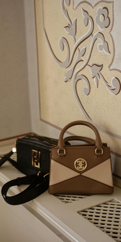Stylish handbags displayed on a decorative shelf in an elegant Istanbul interior.
